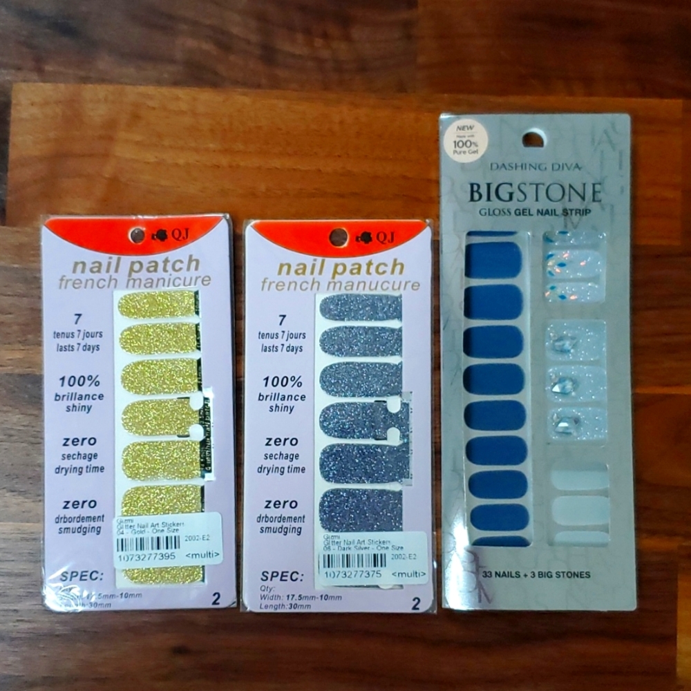 Lot of 3 sets of glittery nail stickers.